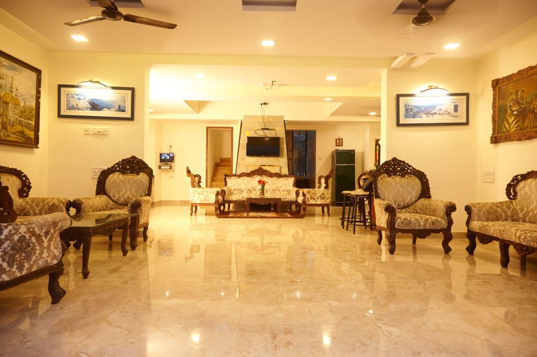 Long marble living hall with sofas