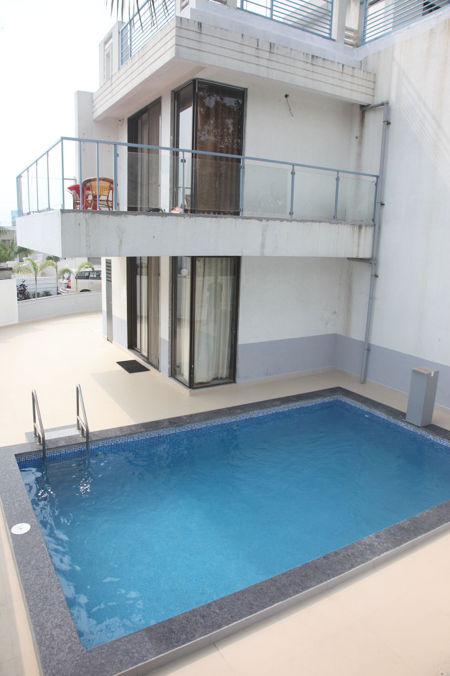 Private pool beside Villa 1 at Sun Palms, Lonavala
